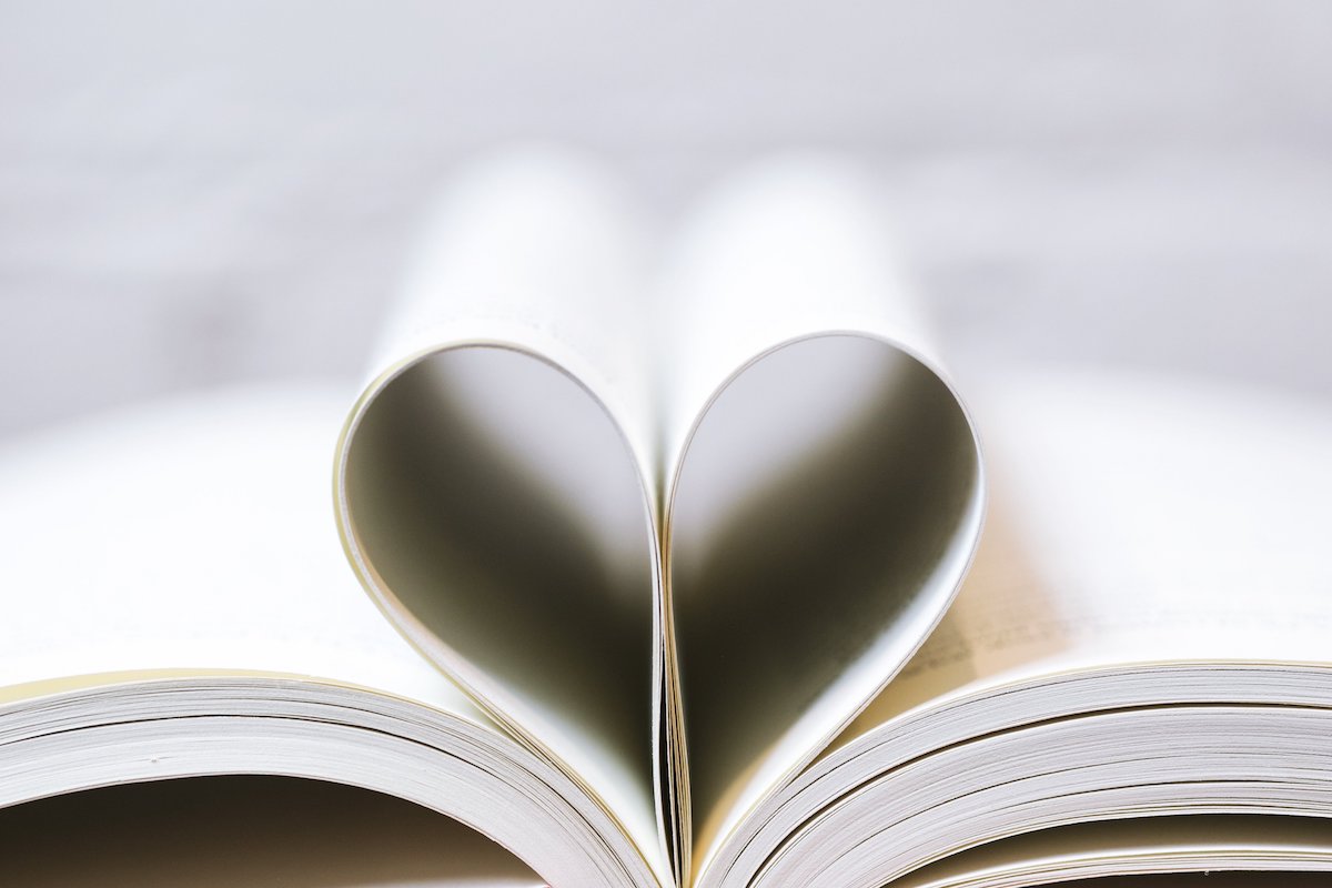book pages in a heart shape representing short stories for middle school