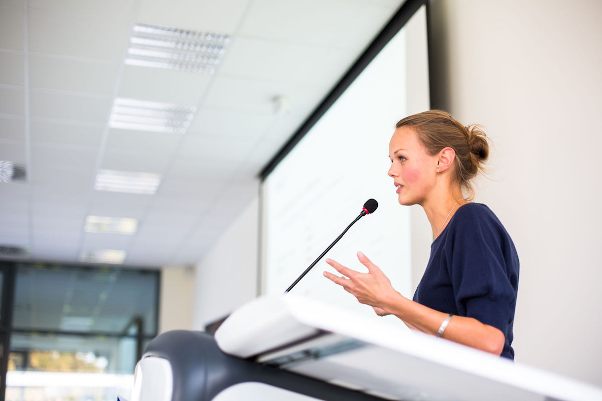 woman giving a presentation on professional development