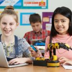 Pupils studying robotics; robotics and AI lesson plans concept