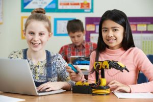 Pupils studying robotics; robotics and AI lesson plans concept