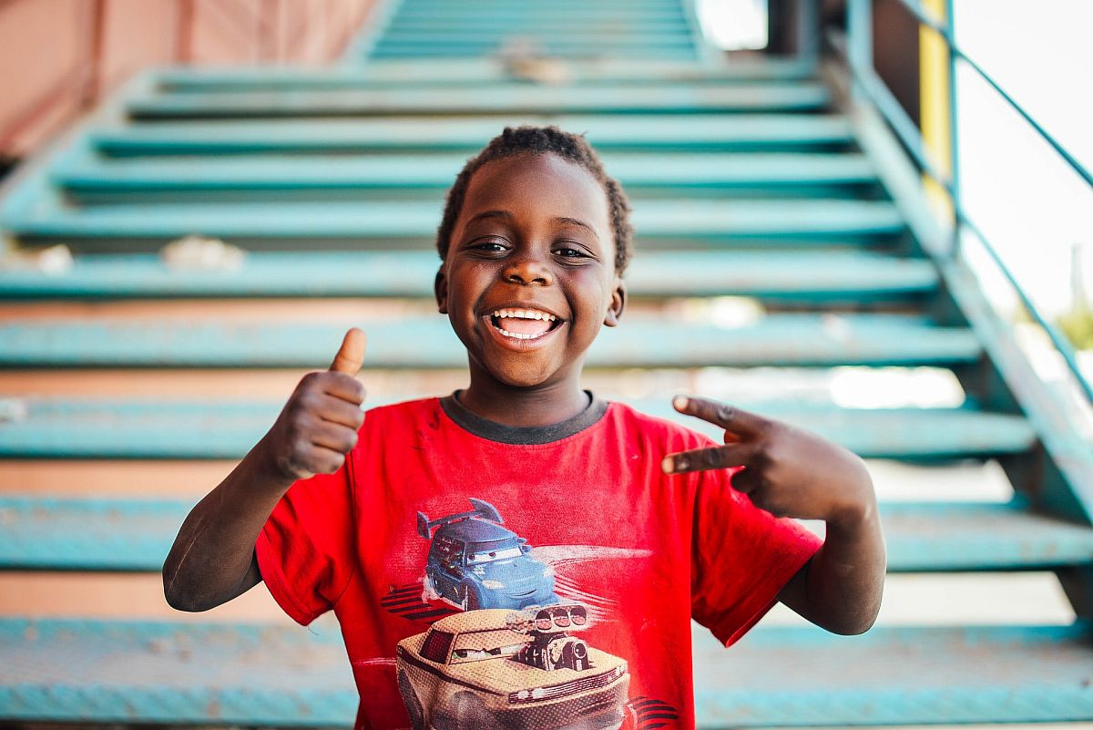 Happy boy giving a thumbs up; cultures and ethnicities concept