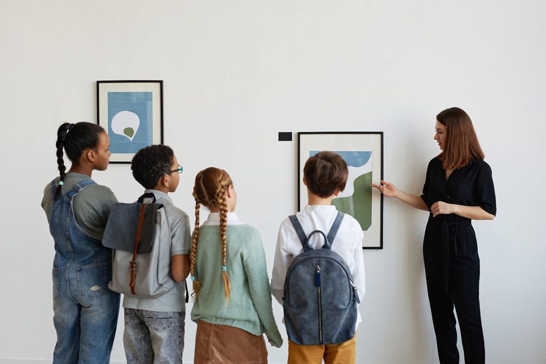 Children visiting an art gallery; community destinations concept