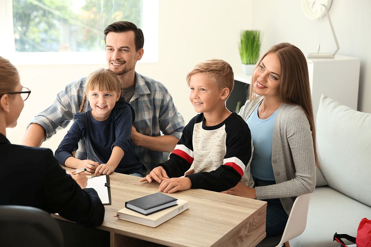 Family speaking to professional; extra resources concept
